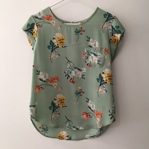 Cheerful floral top. Wear to work or around town!